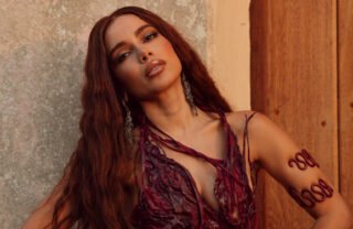 Anitta reage a rumor de que teria pedido para musas da Grande Rio evitarem brilho em sua coroação; assista